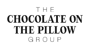 Firmenlogo: The Chocolate on the Pillow Group GmbH
